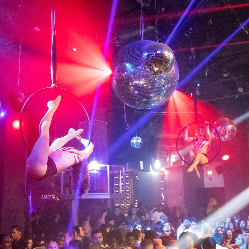 Dancers on the floor at Parq with disco ball lighting